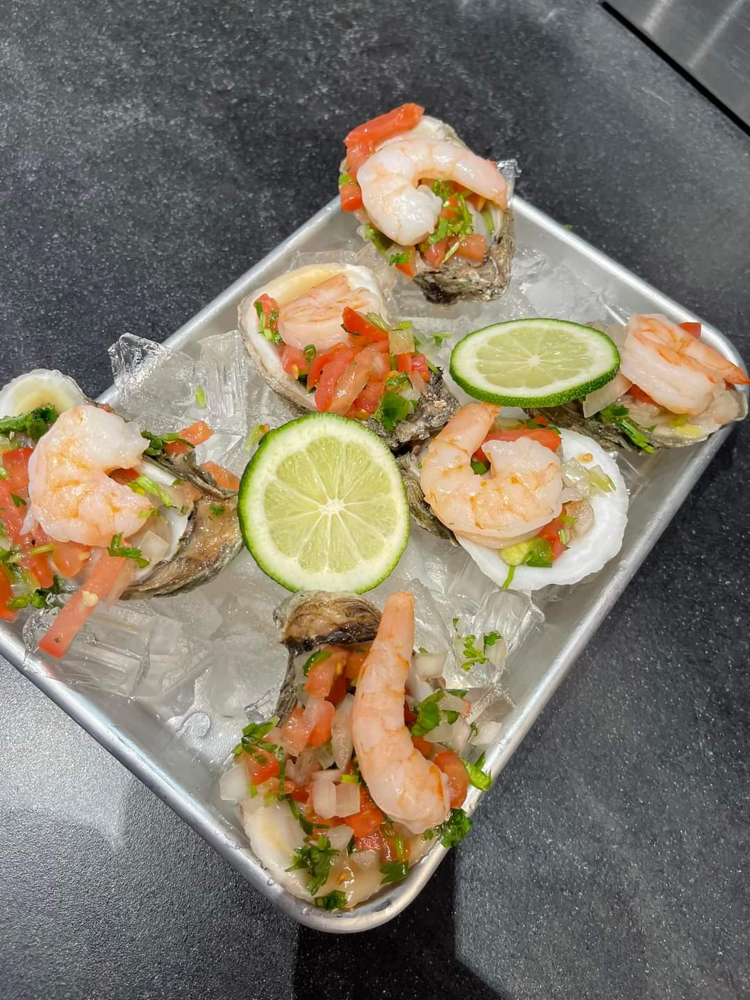Seafood with lime on ice.